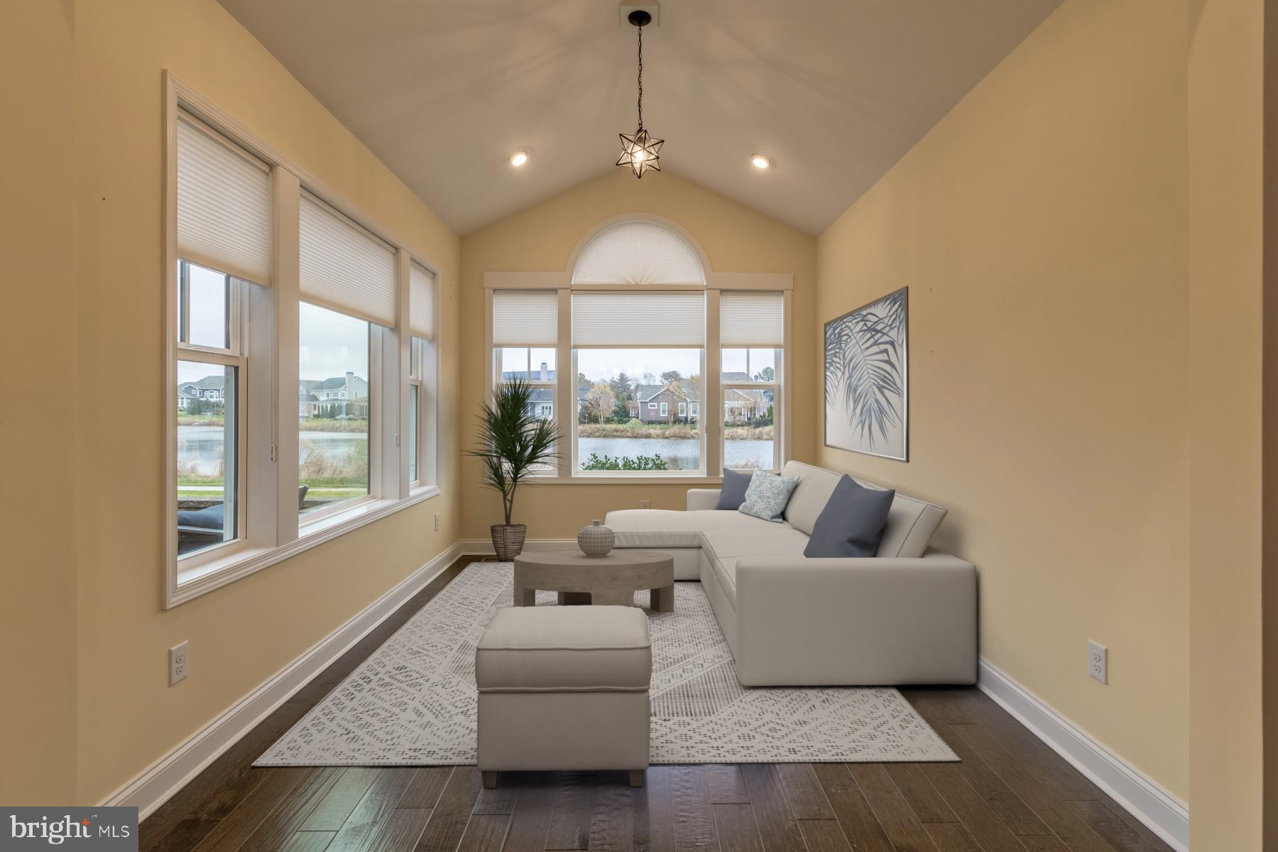 36885 Crossrail Way Lewes, DE 19958 - Photo 20 of 70 a living room with furniture and a large window