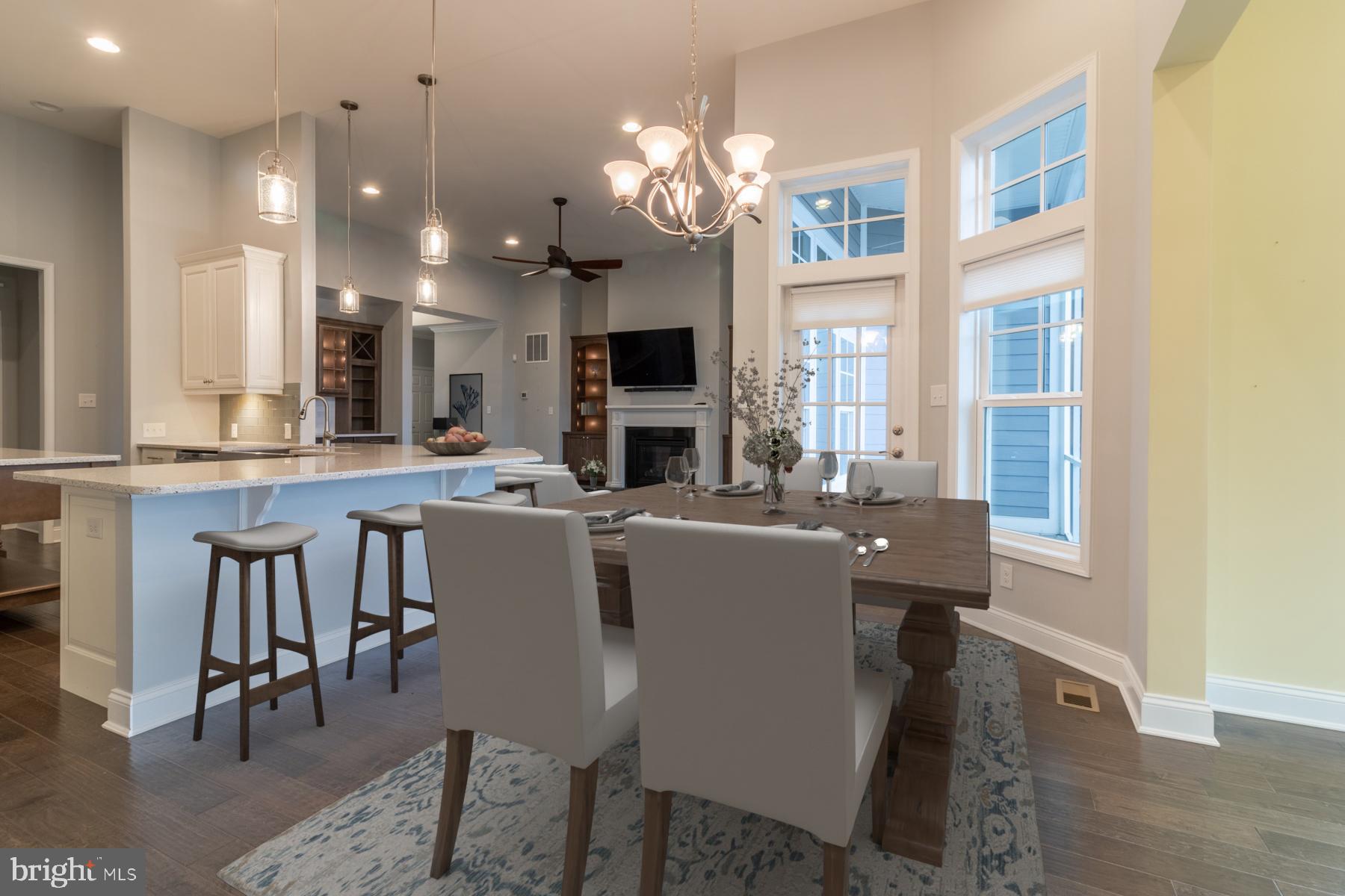 36885 Crossrail Way Lewes, DE 19958 - Photo 23 of 70 a large kitchen with a table and chairs