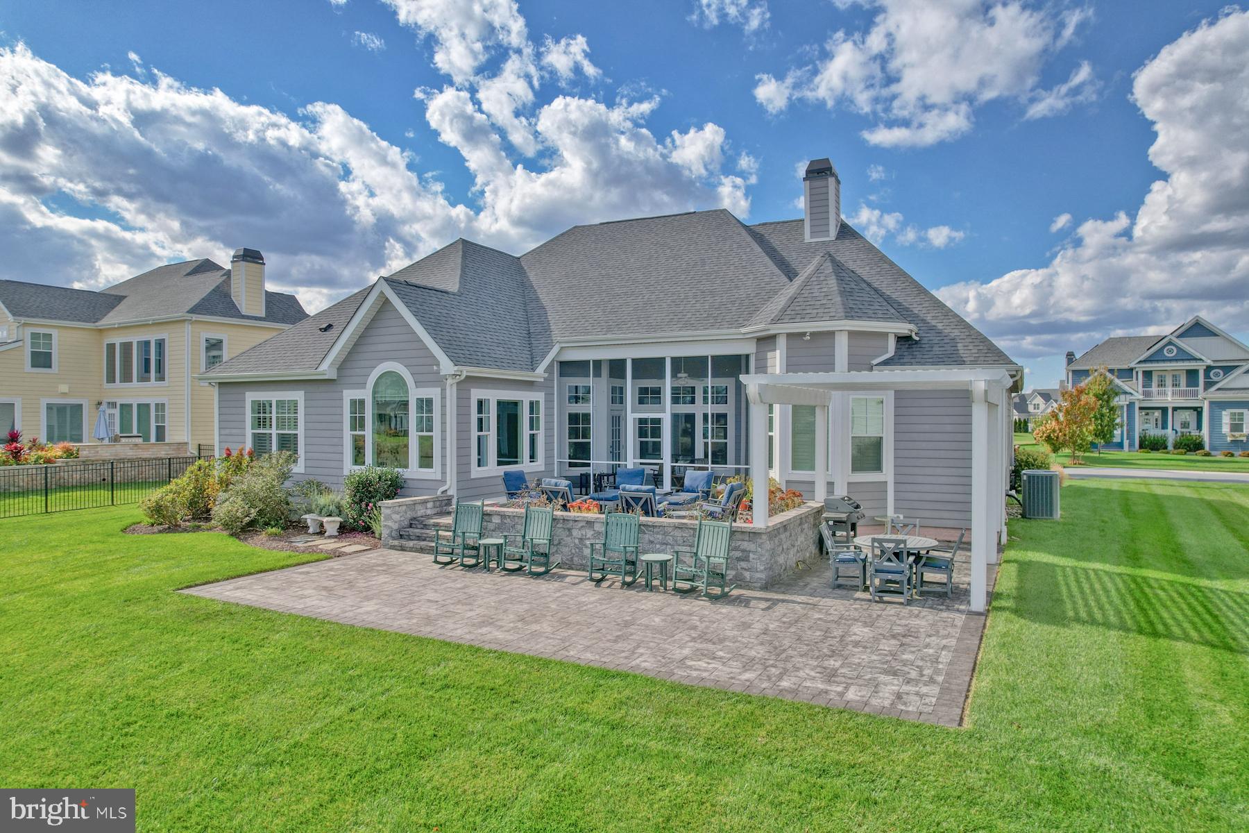 36885 Crossrail Way Lewes, DE 19958 - Photo 5 of 70 a front view of a house with garden and porch