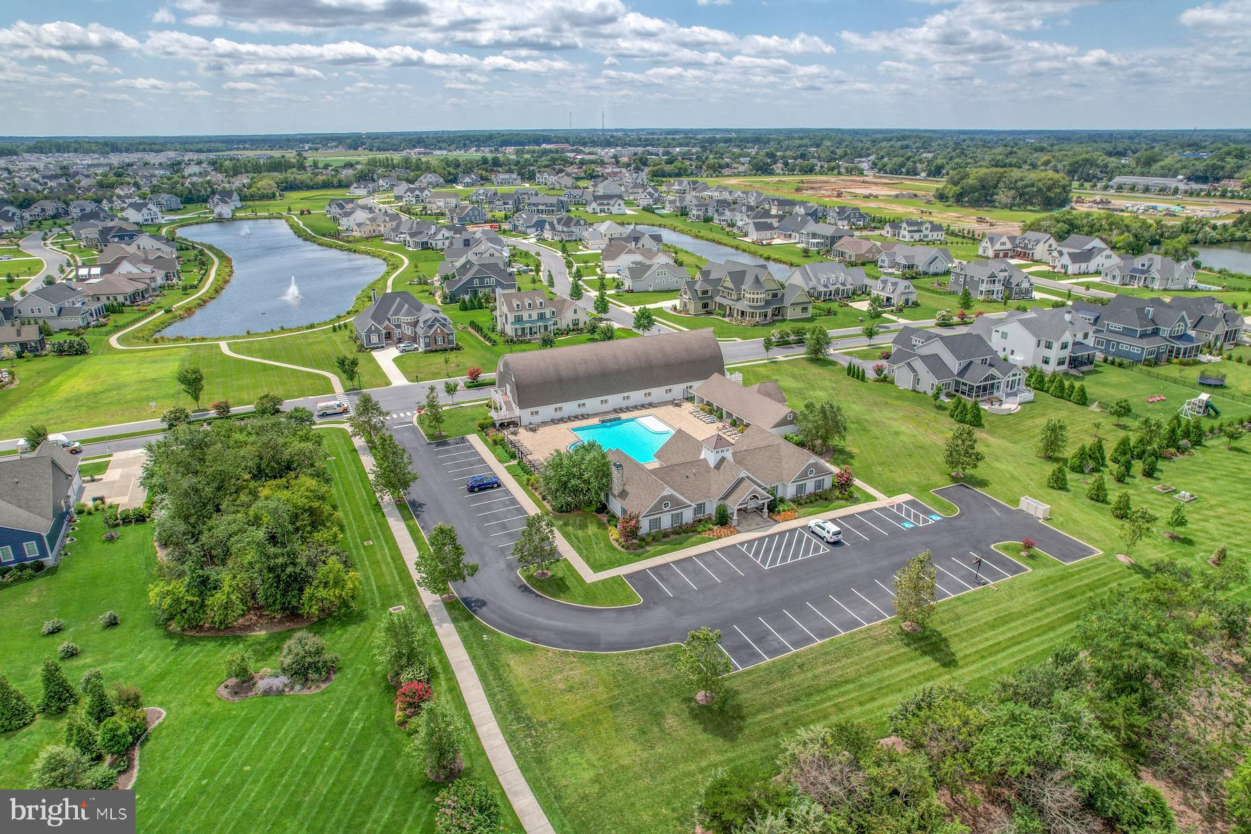 36885 Crossrail Way Lewes, DE 19958 - Photo 51 of 70 an aerial view of residential houses with outdoor space and river
