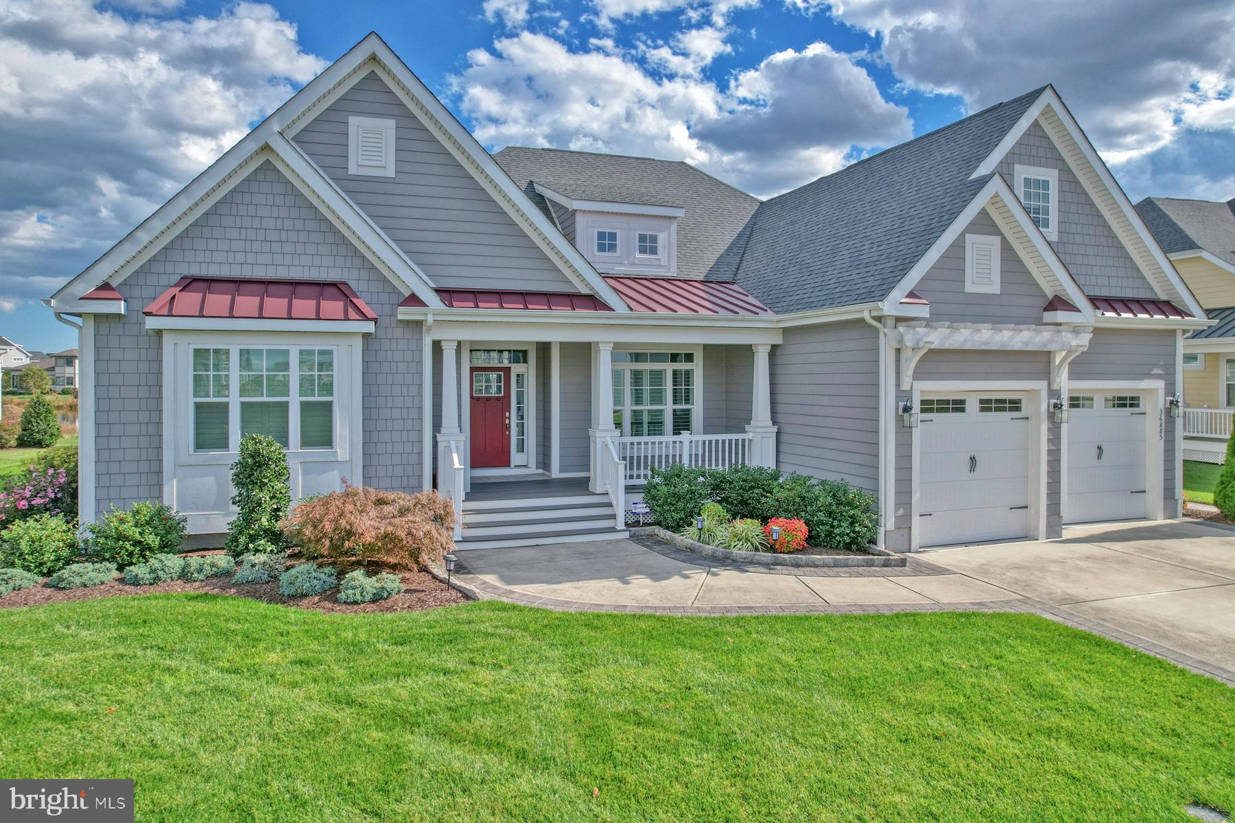36885 Crossrail Way Lewes, DE 19958 - Photo 7 of 70 a front view of a house with garden