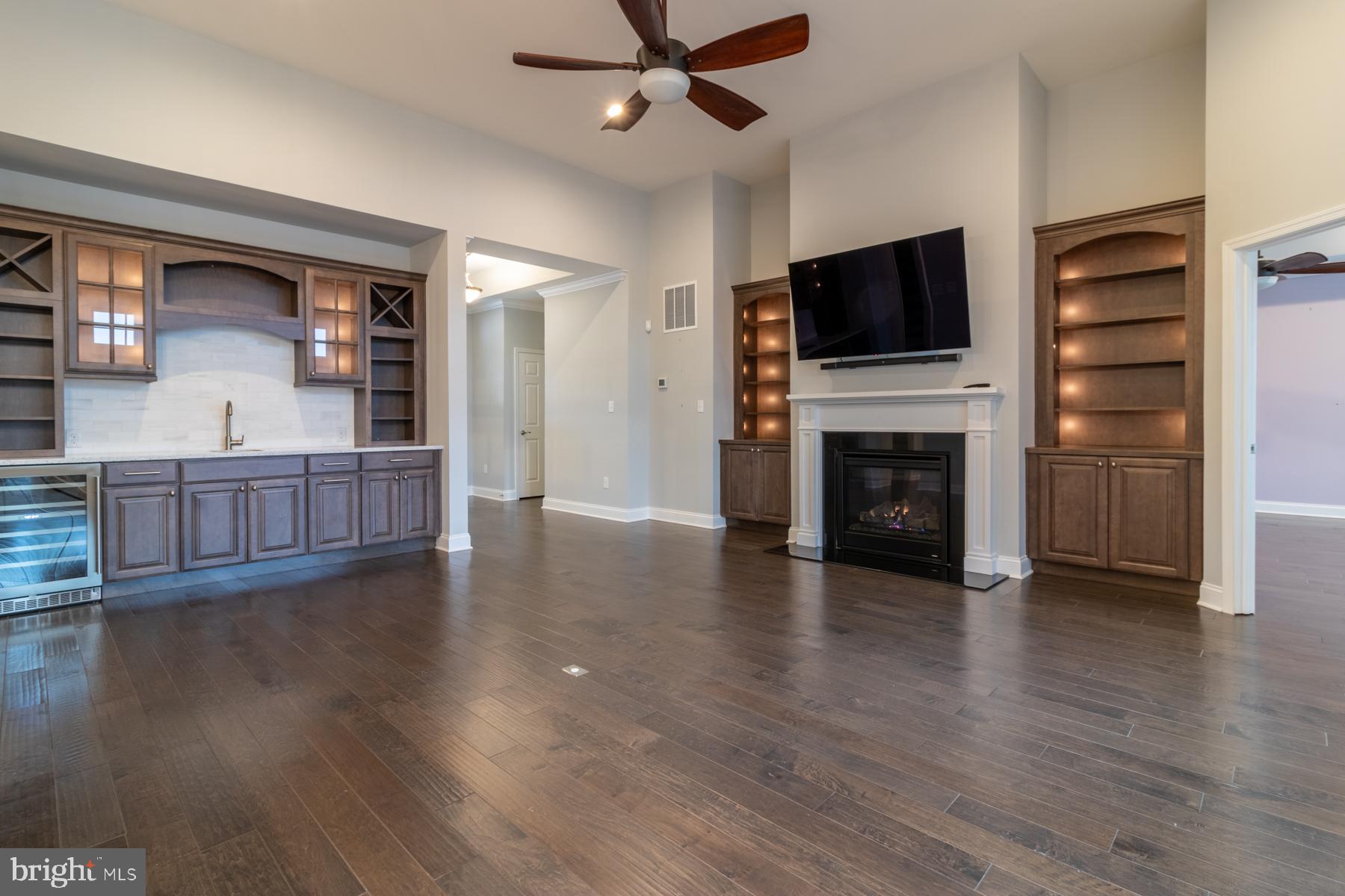 36885 Crossrail Way Lewes, DE 19958 - Photo 10 of 70 a view of a livingroom with furniture wooden floor and window
