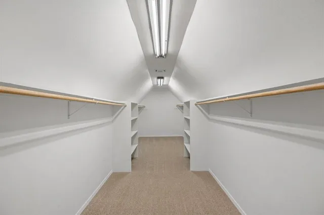 a view of a room with racks on the wall