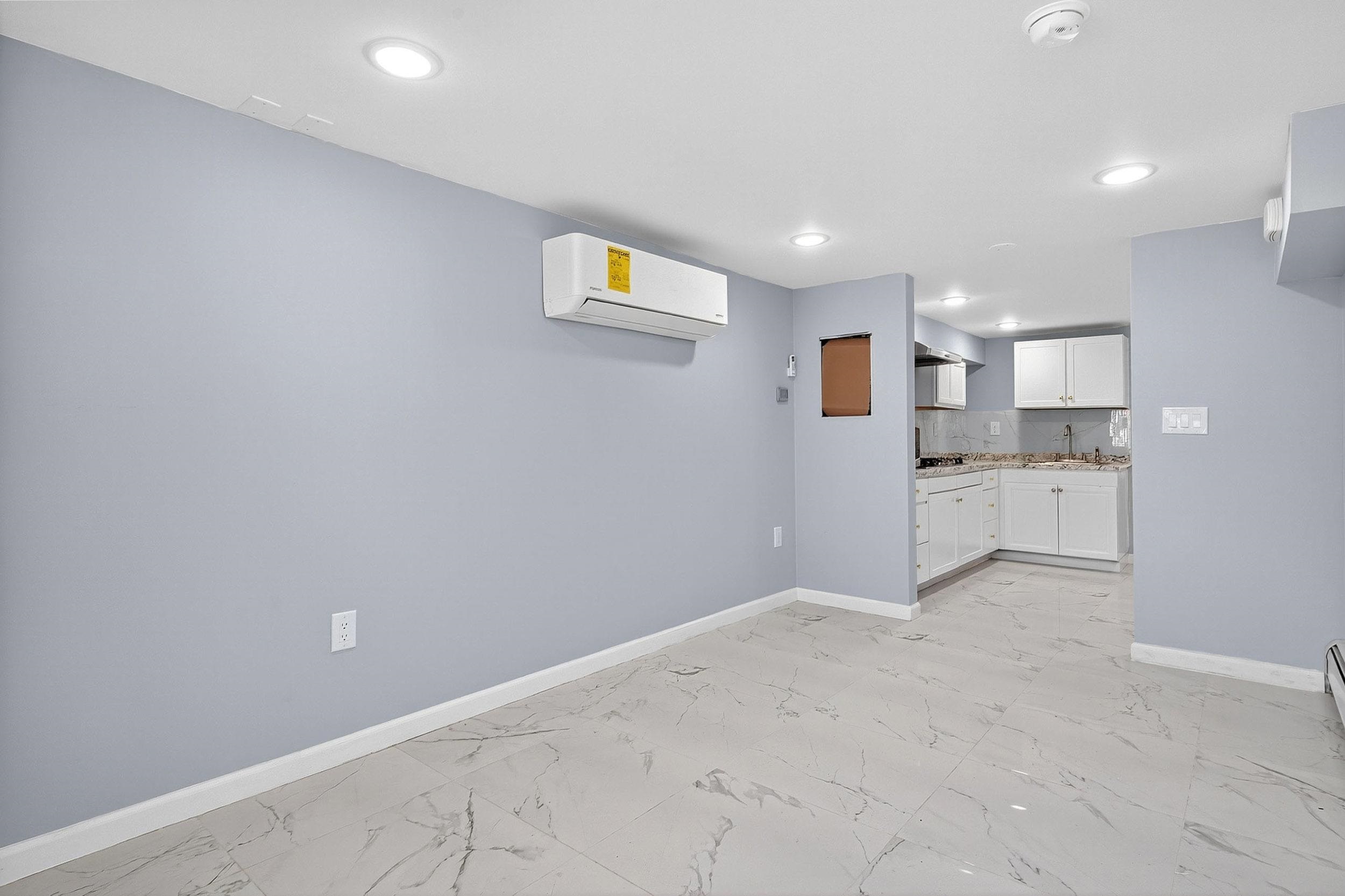 43 Sycamore Road, Unit 1 Jersey City, NJ 07305 - Photo 7 of 15 a view of a kitchen with a sink