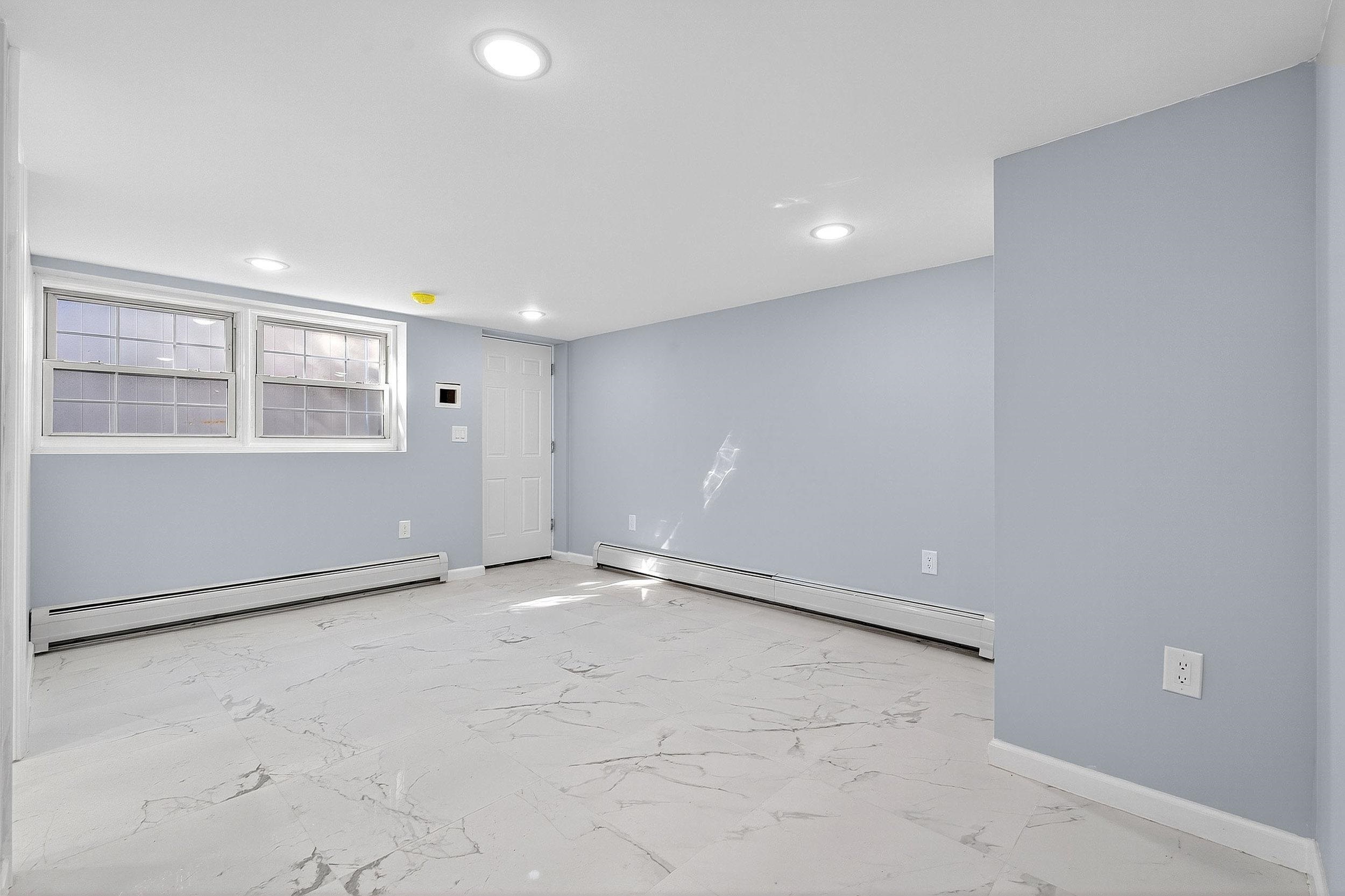 43 Sycamore Road, Unit 1 Jersey City, NJ 07305 - Photo 10 of 15 an empty room with windows