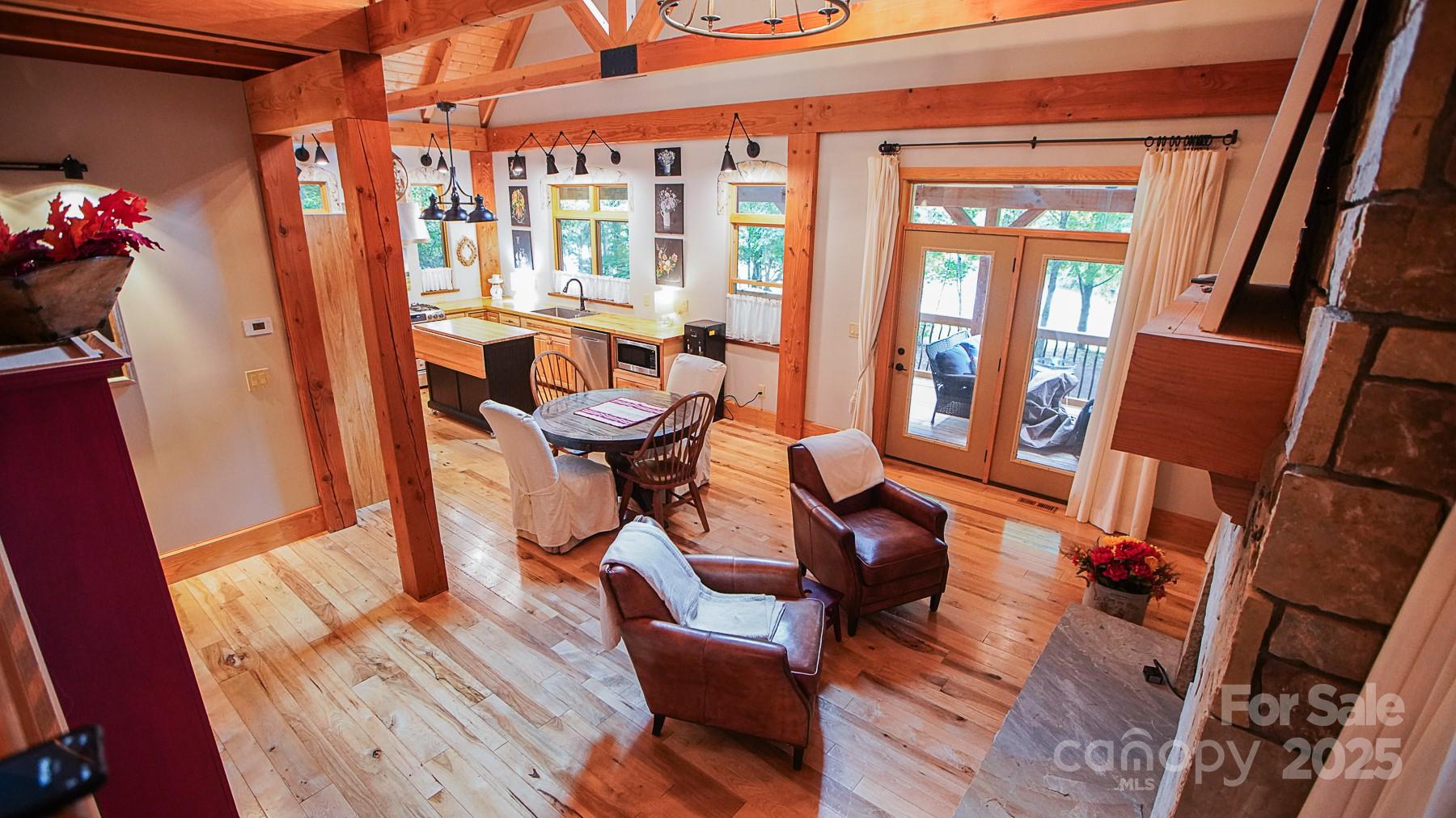 1048 South River Road Sylva, NC 28779 - Photo 11 of 42 a view of a living room and dining room