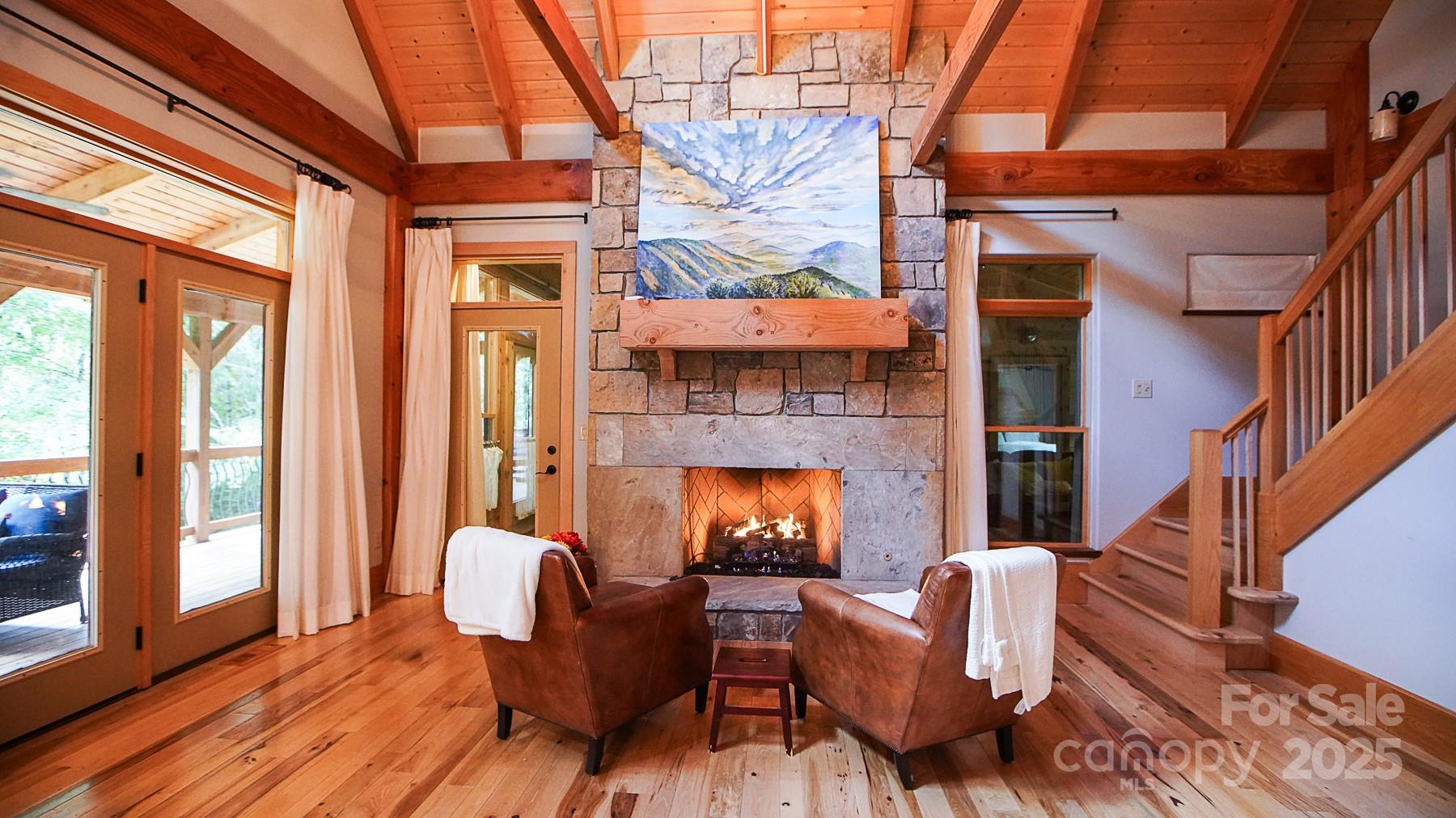 1048 South River Road Sylva, NC 28779 - Photo 12 of 42 a outdoor space with patio furniture and wooden floor