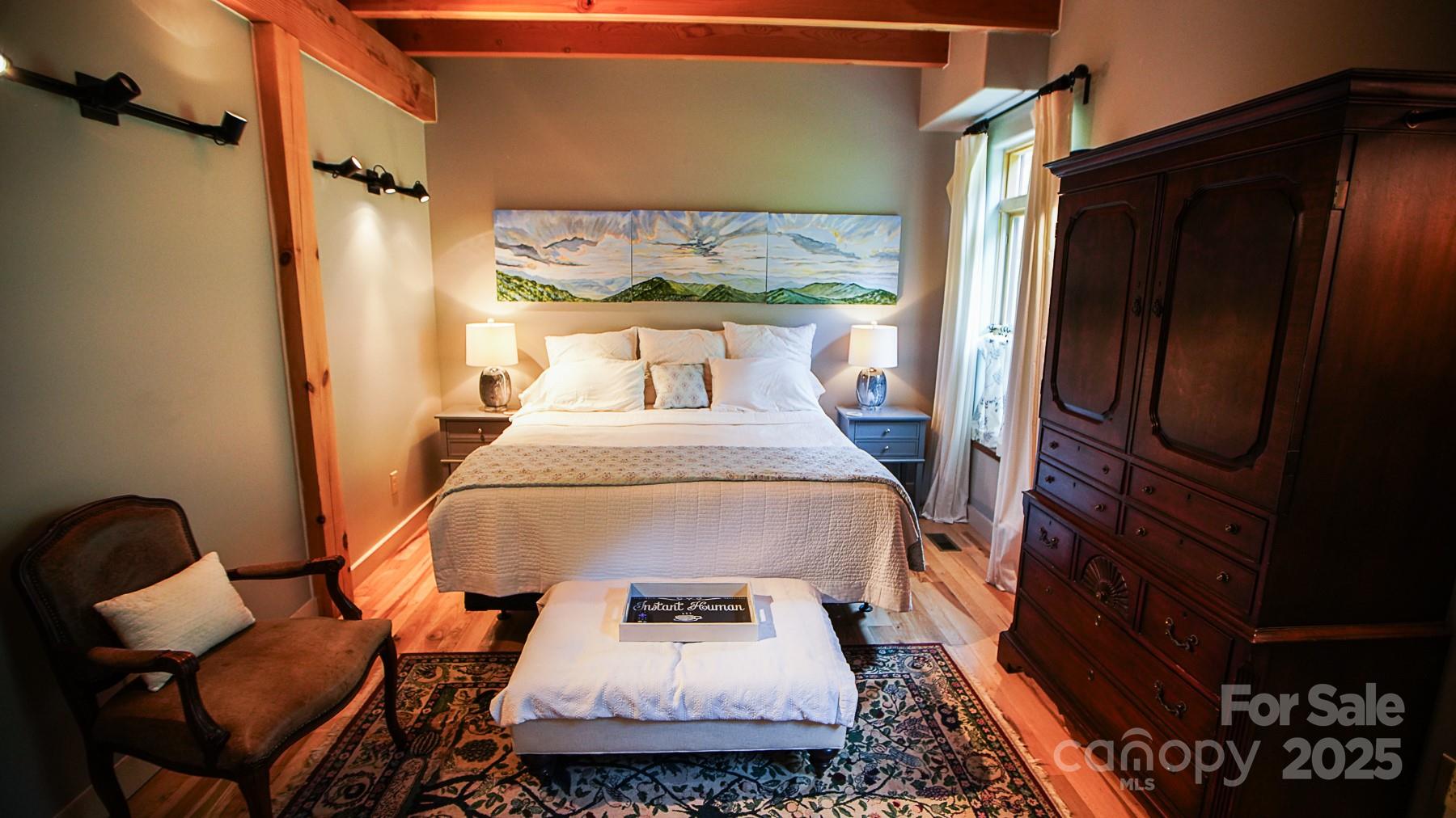 1048 South River Road Sylva, NC 28779 - Photo 14 of 42 a room with furniture and a window