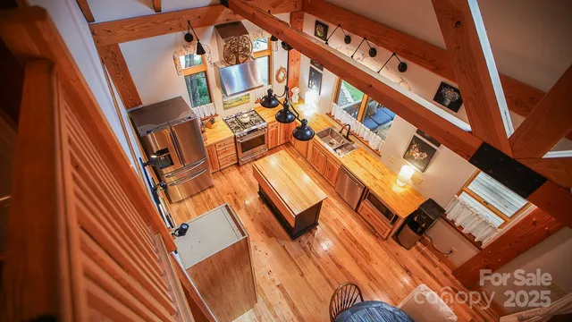 a view of an chairs and table in the balcony