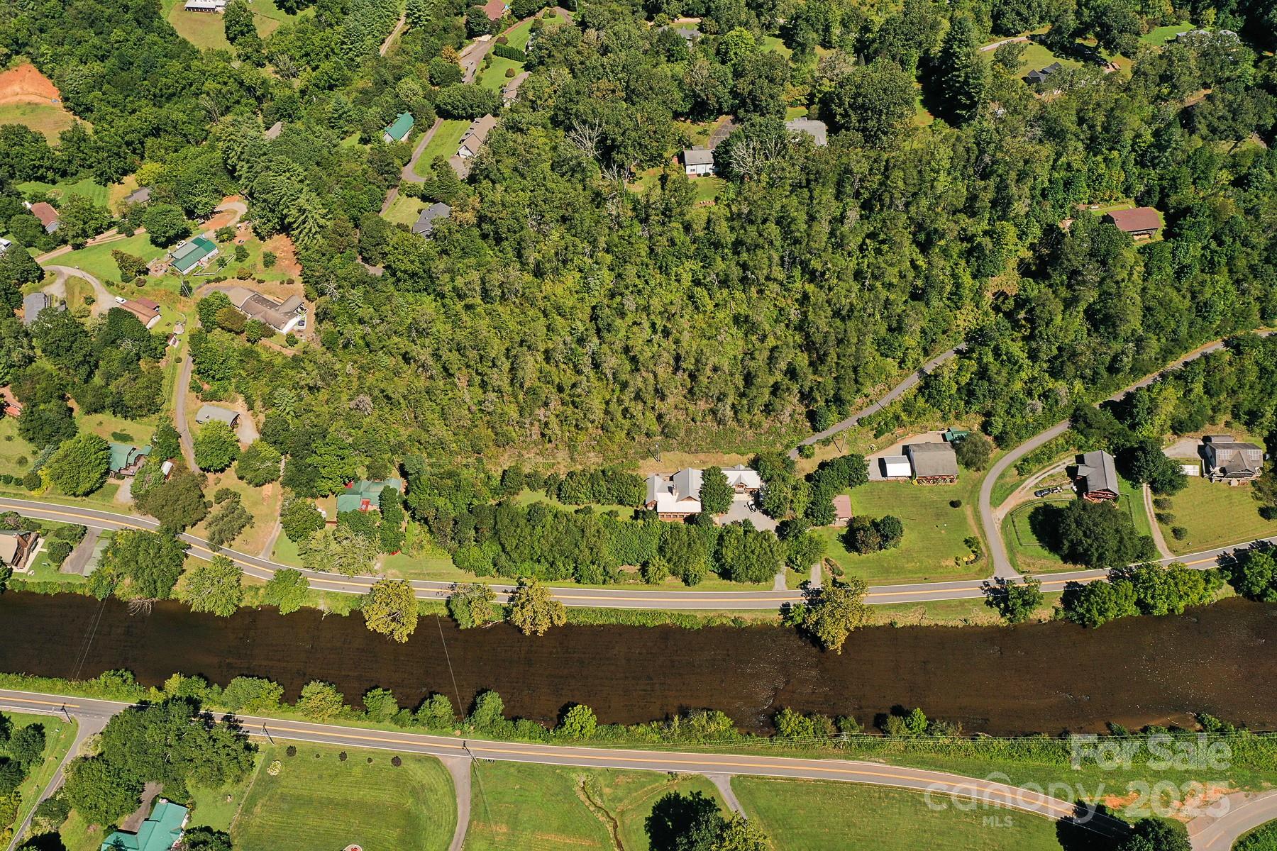 1048 South River Road Sylva, NC 28779 - Photo 36 of 42 an aerial view of a residential houses with yard