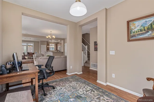 a view of a livingroom with furniture and a livingroom