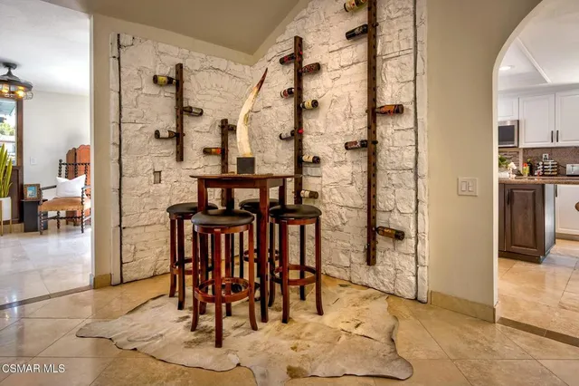 a dining room with chandelier