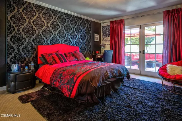 a bathroom with a toilet and a sink