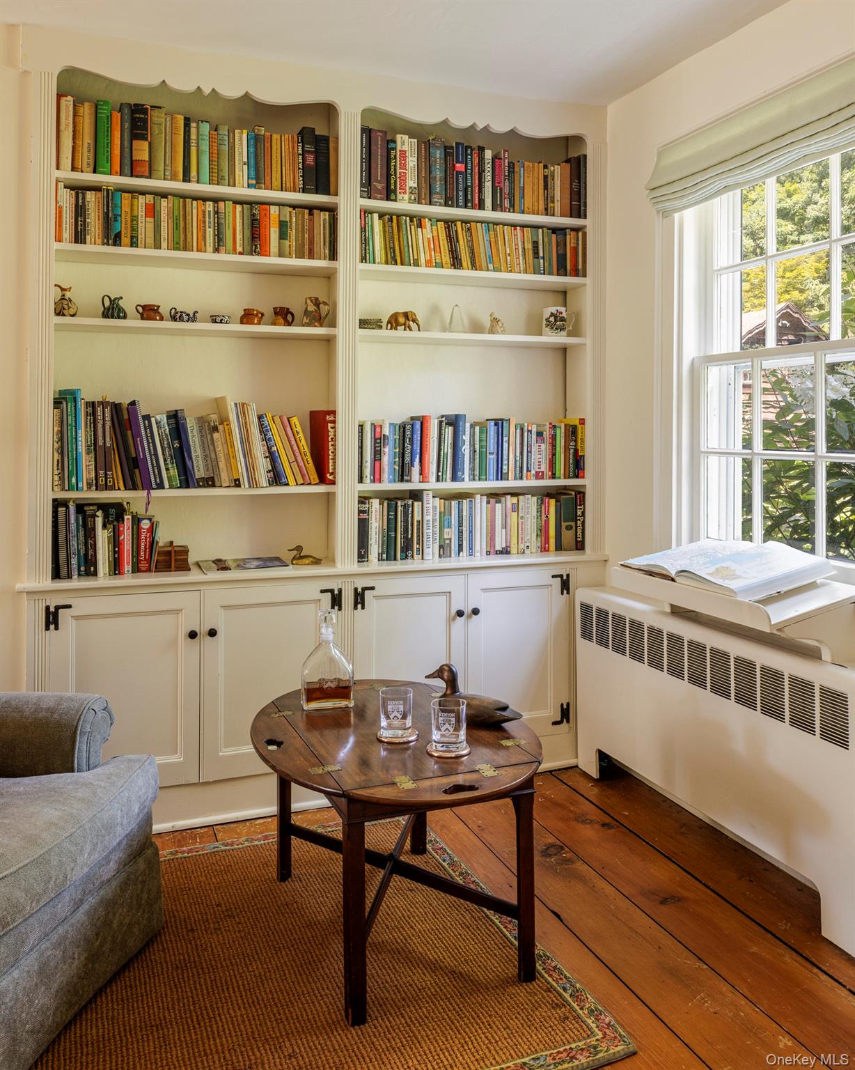 425 Camby Road Millbrook, NY 12545 - Photo 10 of 39 a room with furniture and a book shelf
