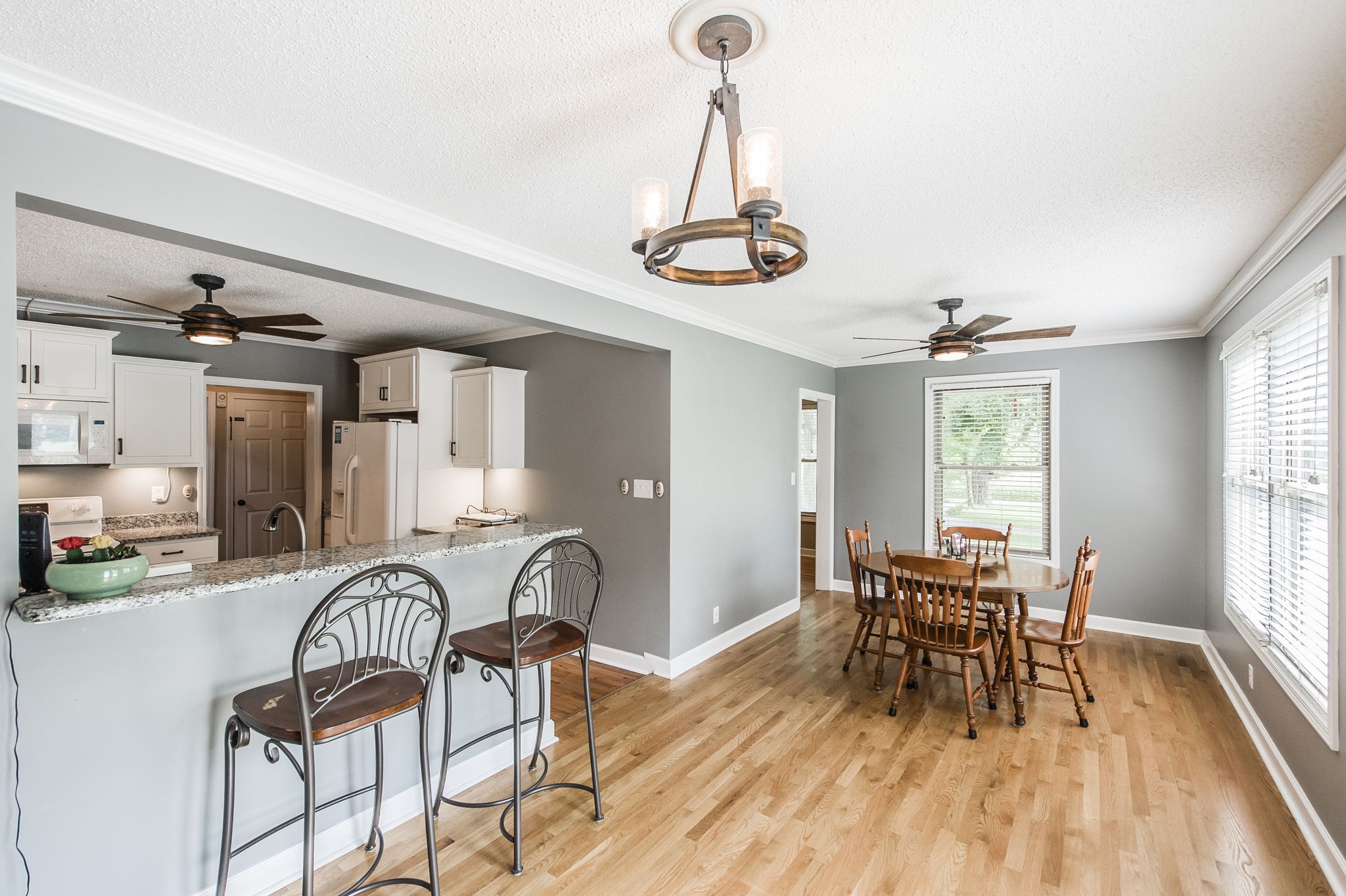 4131 Corbin Sneed Road Springfield, TN 37172 - Photo 17 of 52 a view of a dining room with furniture window and wooden floor