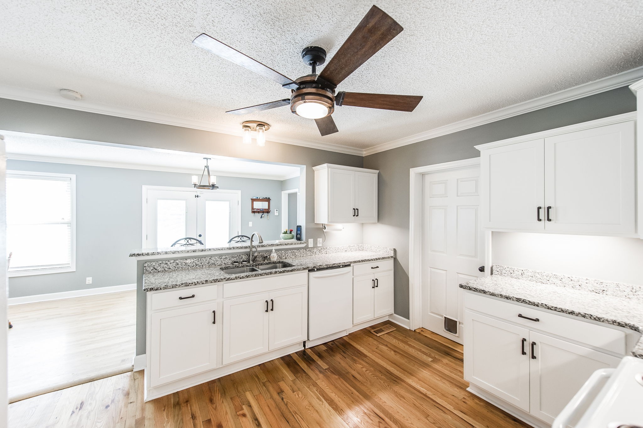 4131 Corbin Sneed Road Springfield, TN 37172 - Photo 21 of 52 a kitchen with granite countertop cabinets stainless steel appliances a sink and a window