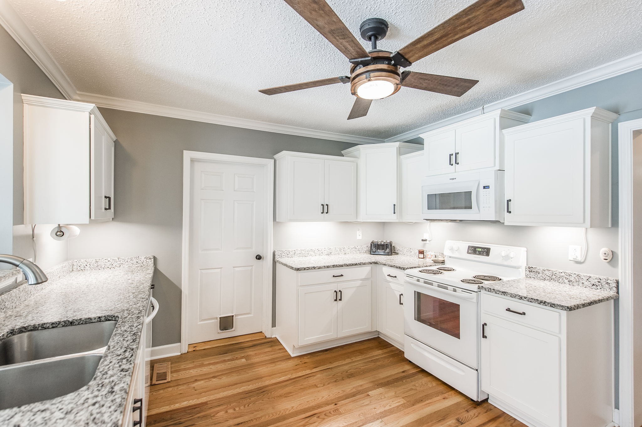 4131 Corbin Sneed Road Springfield, TN 37172 - Photo 22 of 52 a kitchen with stainless steel appliances sink cabinets and window