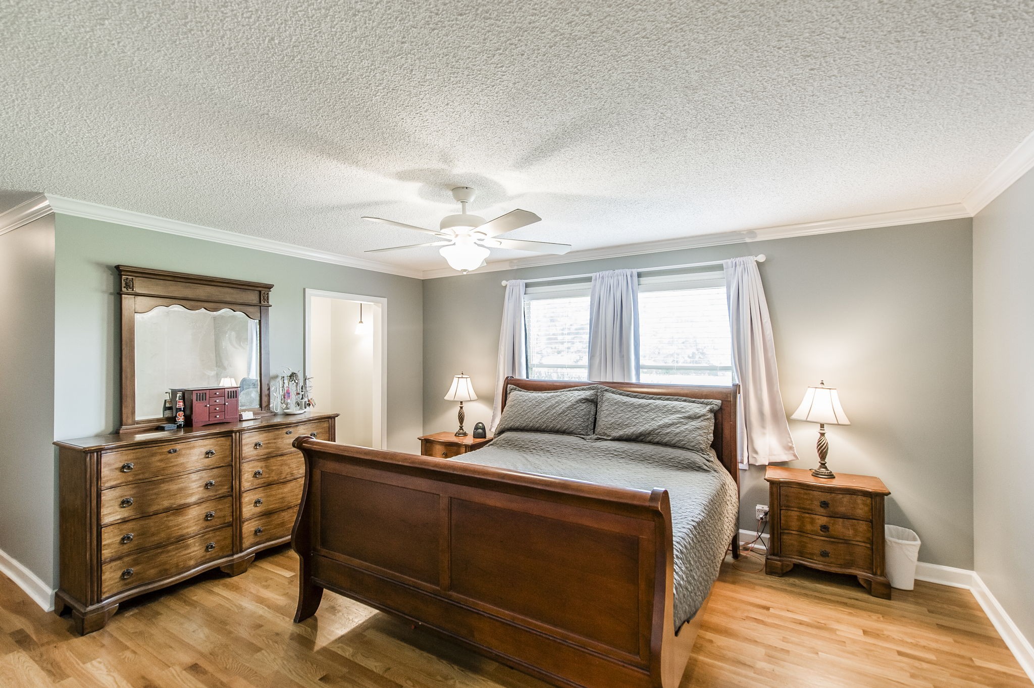 4131 Corbin Sneed Road Springfield, TN 37172 - Photo 26 of 52 a bedroom with a bed and wooden floor