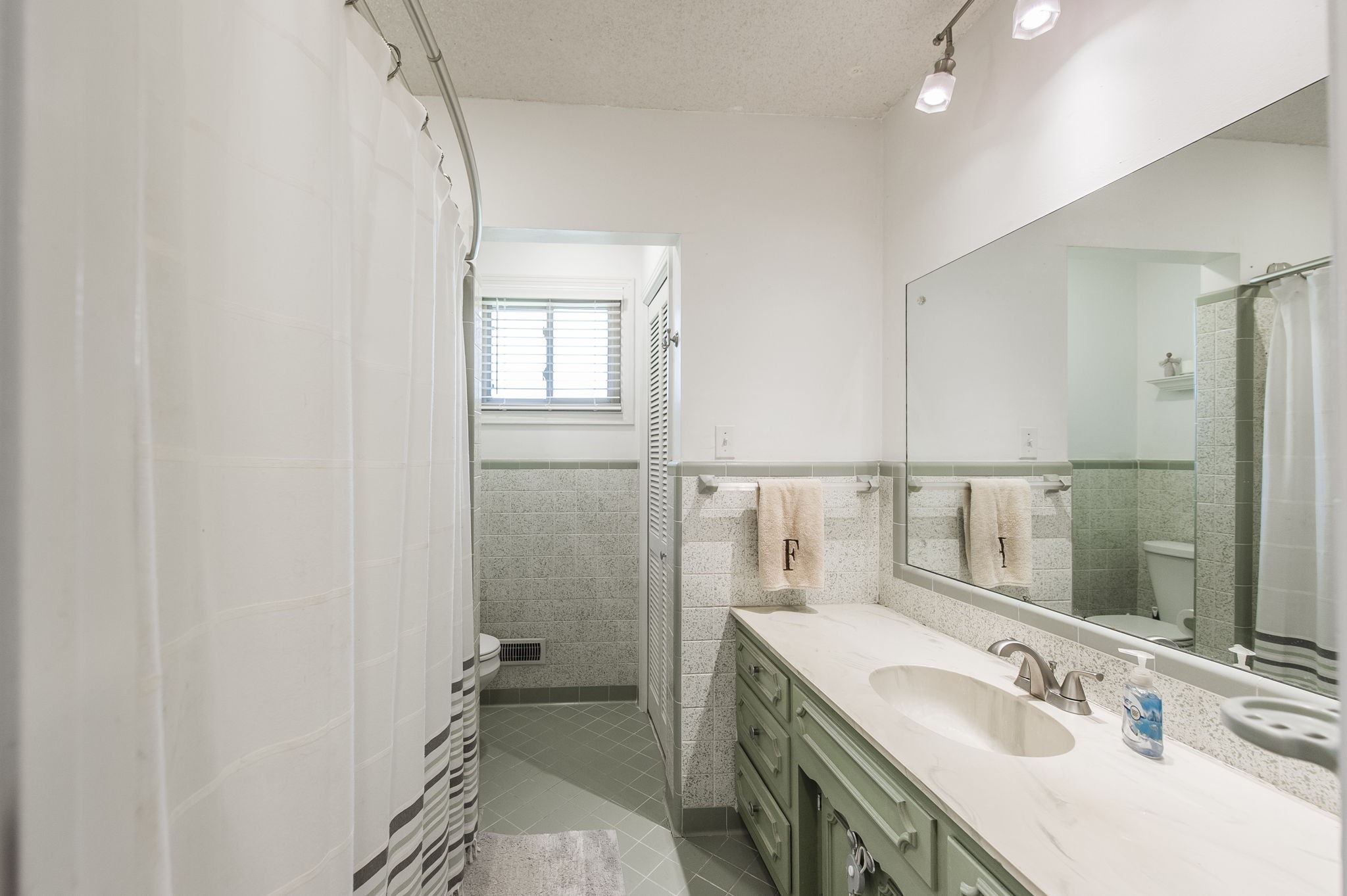 4131 Corbin Sneed Road Springfield, TN 37172 - Photo 29 of 52 a bathroom with a sink vanity granite and a mirror