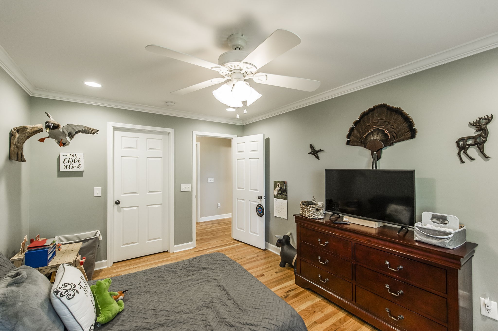 4131 Corbin Sneed Road Springfield, TN 37172 - Photo 32 of 52 a bedroom with a bed and flat screen tv
