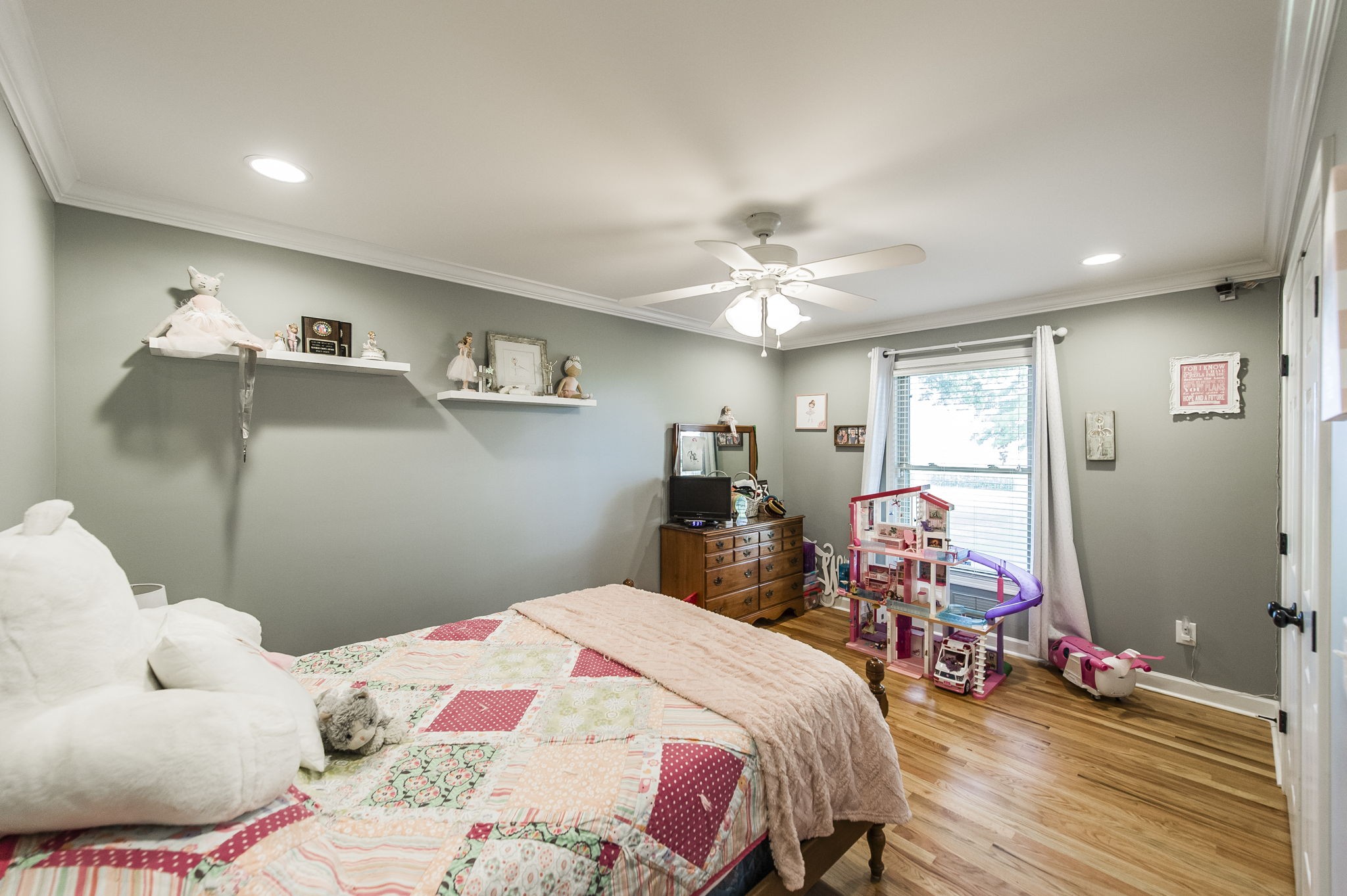 4131 Corbin Sneed Road Springfield, TN 37172 - Photo 34 of 52 a bedroom with a bed and wooden floor