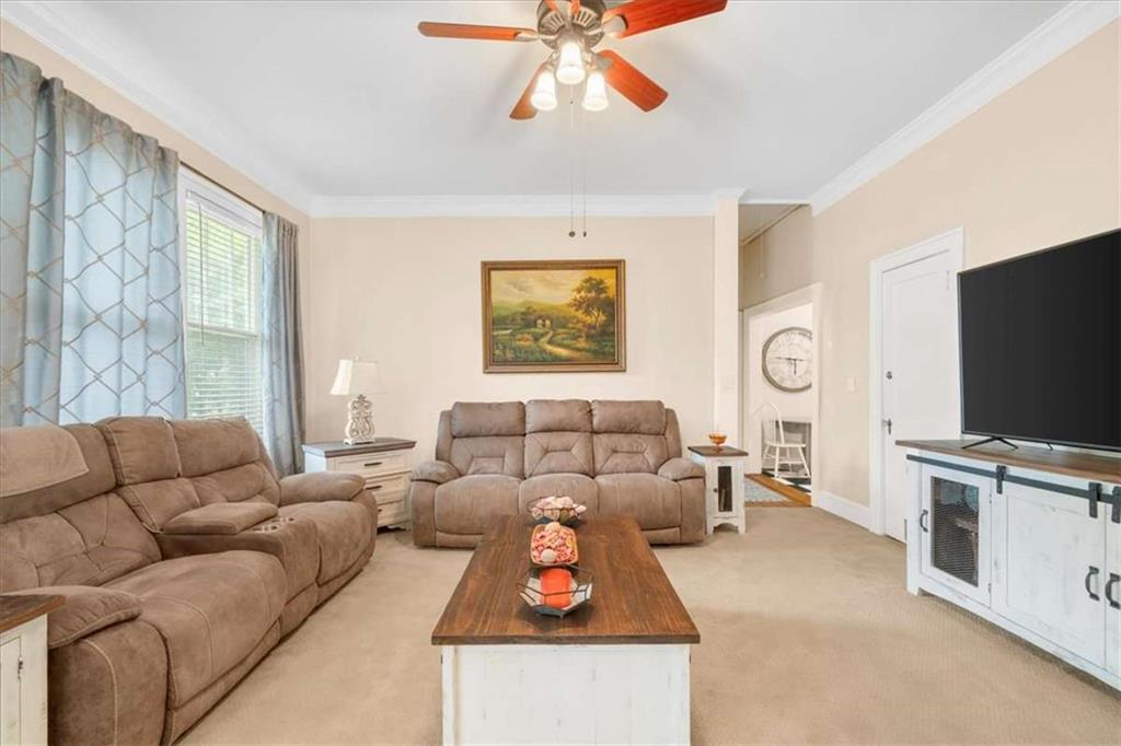 106 Westmore Road Southwest Rome, GA 30165 - Photo 26 of 56 a living room with furniture and a flat screen tv