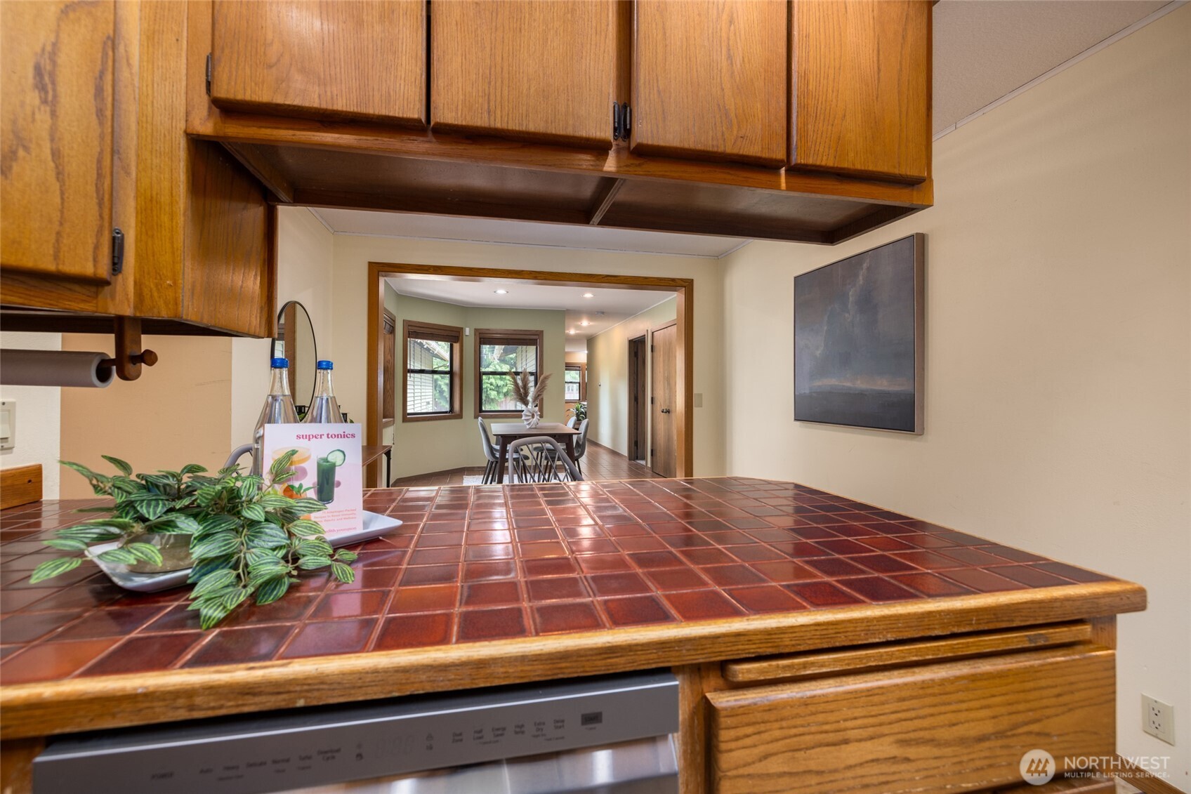 2496 Yew Street Road Bellingham, WA 98229 - Photo 13 of 38 a view of a living room and a potted plant