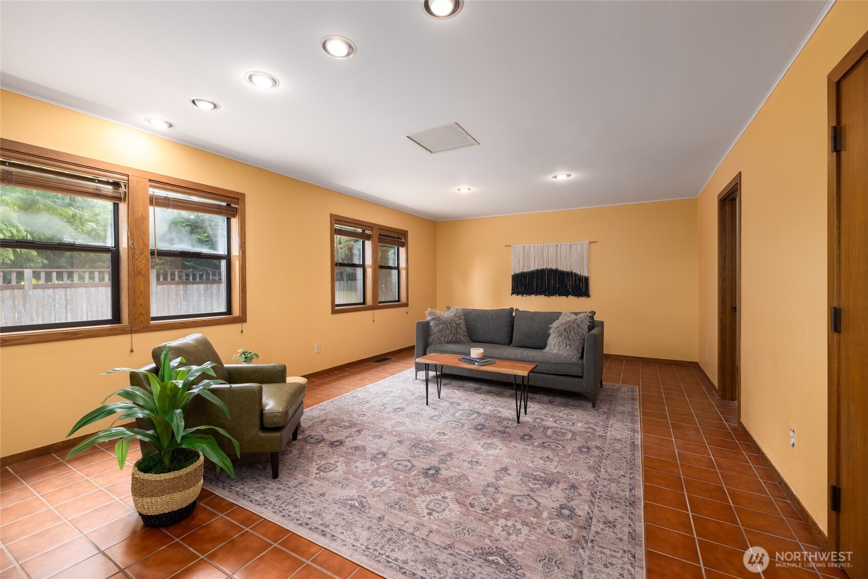 2496 Yew Street Road Bellingham, WA 98229 - Photo 18 of 38 a living room with furniture flowerpot and wooden floor