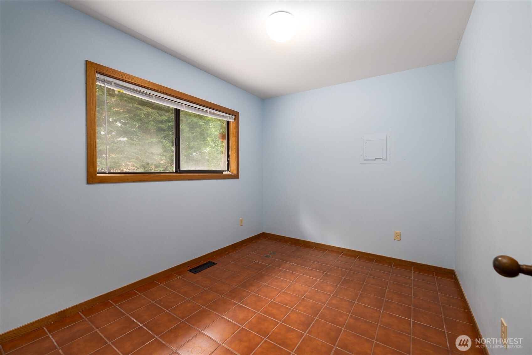 2496 Yew Street Road Bellingham, WA 98229 - Photo 21 of 38 a view of an empty room with a window