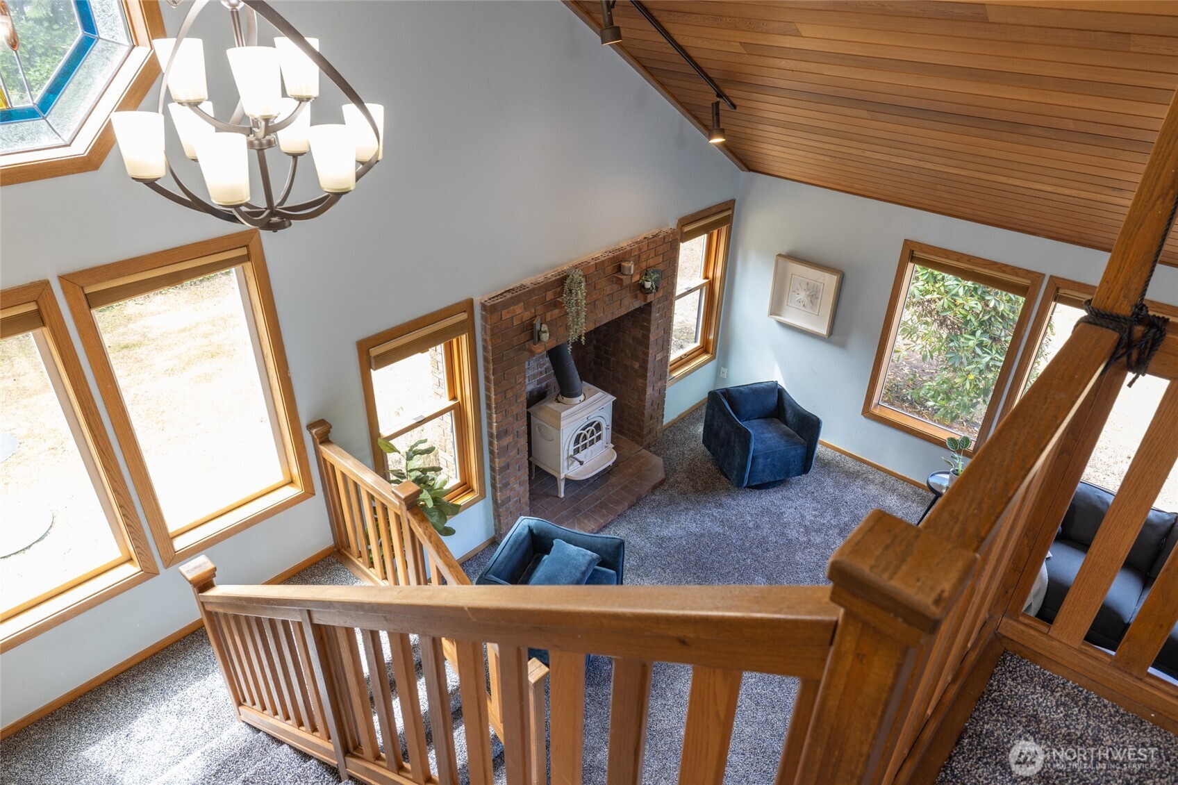 2496 Yew Street Road Bellingham, WA 98229 - Photo 24 of 38 a living room with furniture and a large window