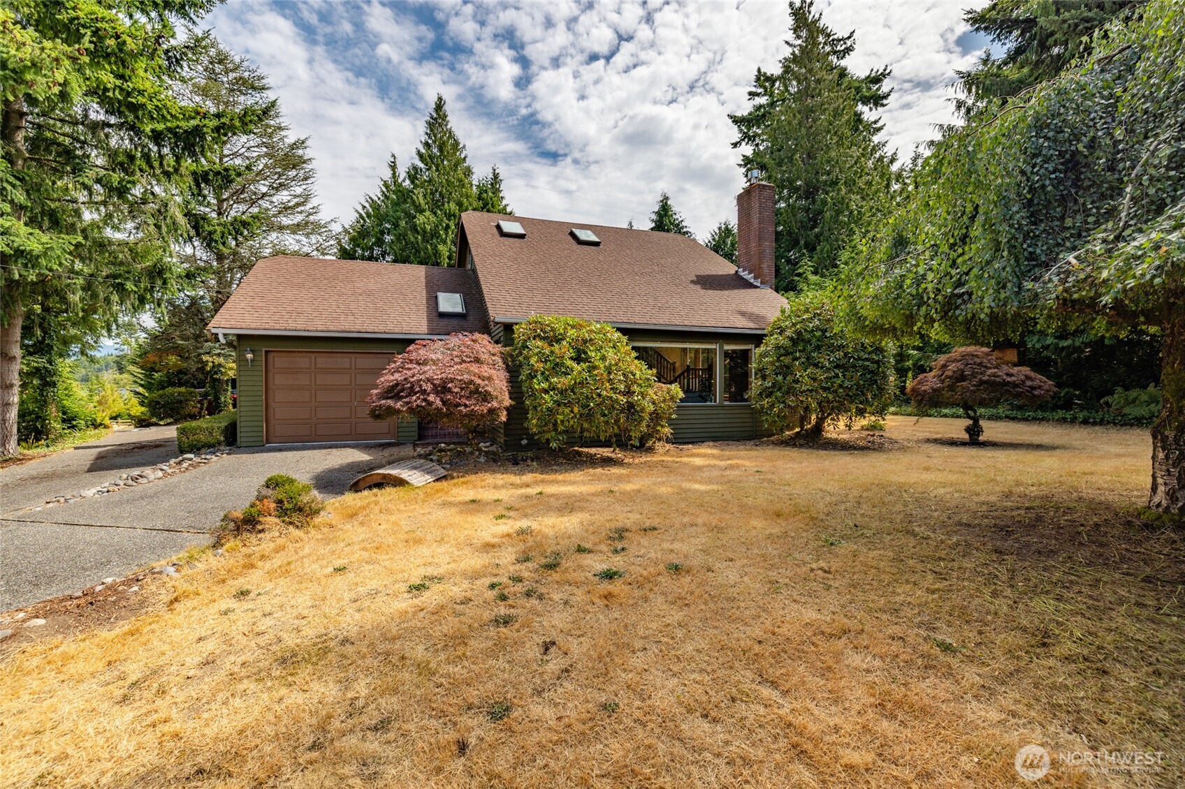 2496 Yew Street Road Bellingham, WA 98229 - Photo 28 of 38 a street view with a car parked in front of it