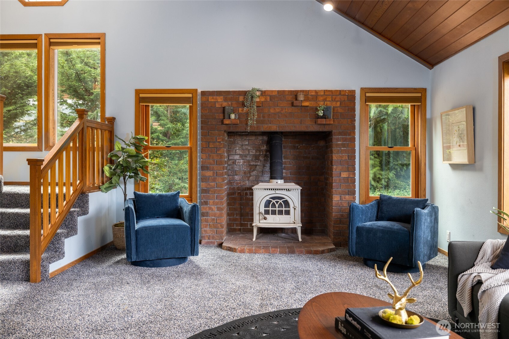 2496 Yew Street Road Bellingham, WA 98229 - Photo 6 of 38 a living room with furniture and a fireplace