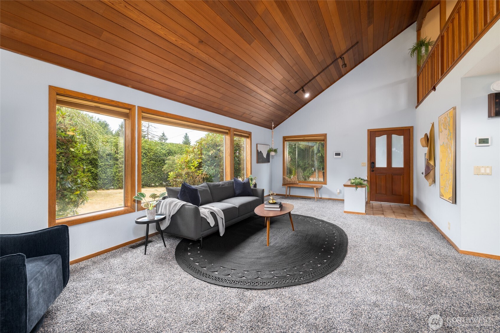 2496 Yew Street Road Bellingham, WA 98229 - Photo 7 of 38 a living room with furniture and a large window