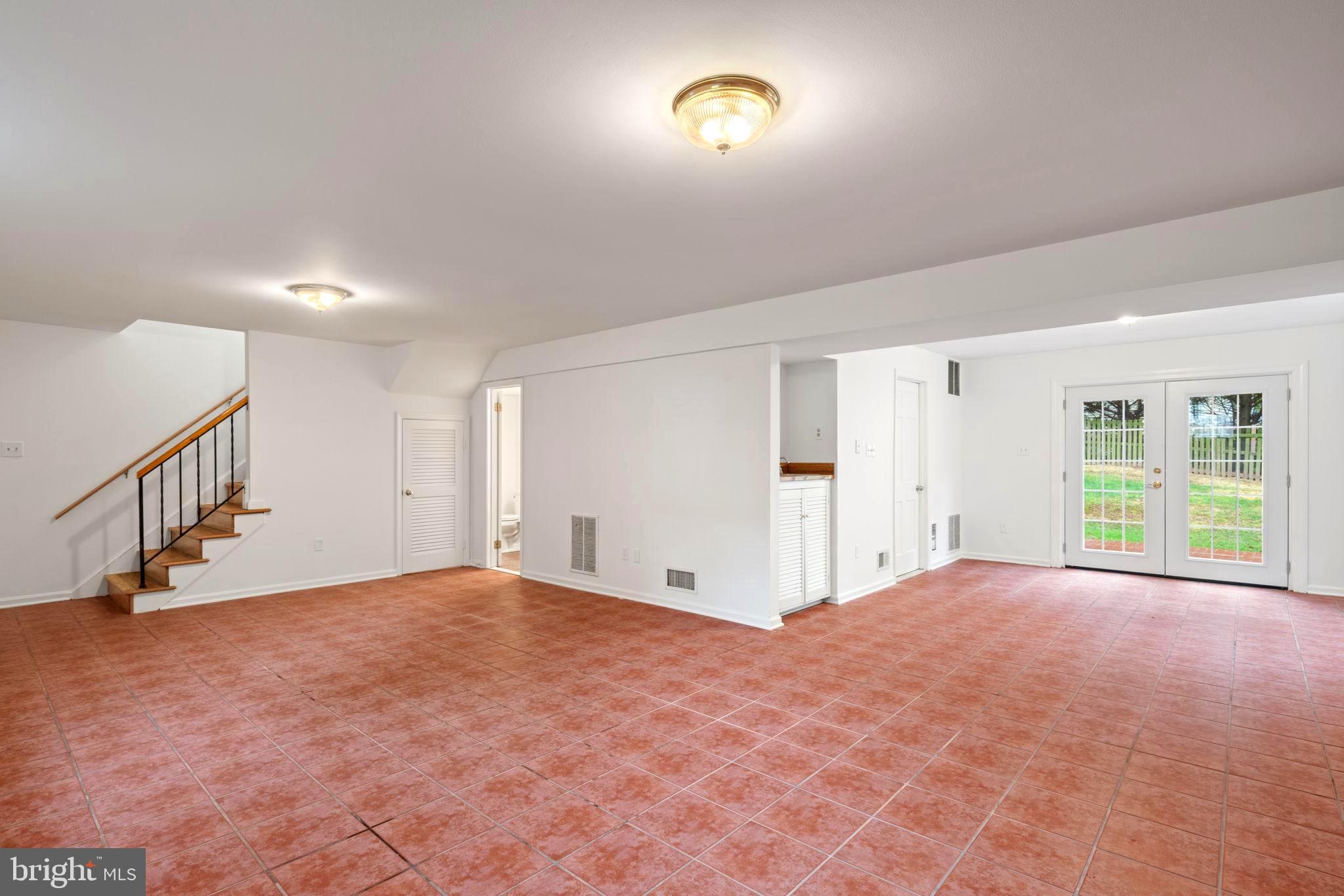 1116 Randolph Road McLean, VA 22101 - Photo 32 of 44 Basement Rec Room w/ walkout double door