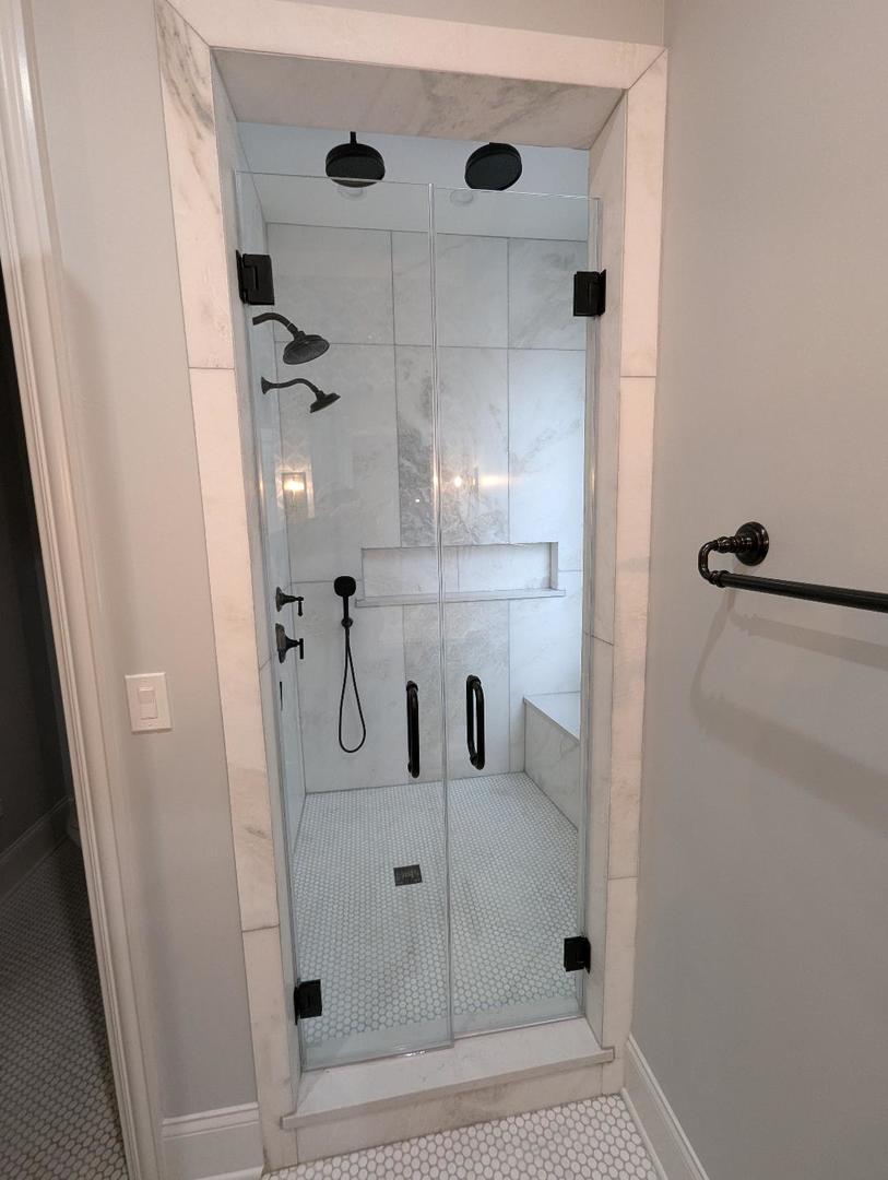 2150 West Monroe Street Chicago, IL 60612 - Photo 63 of 107 a bathroom with a glass shower door