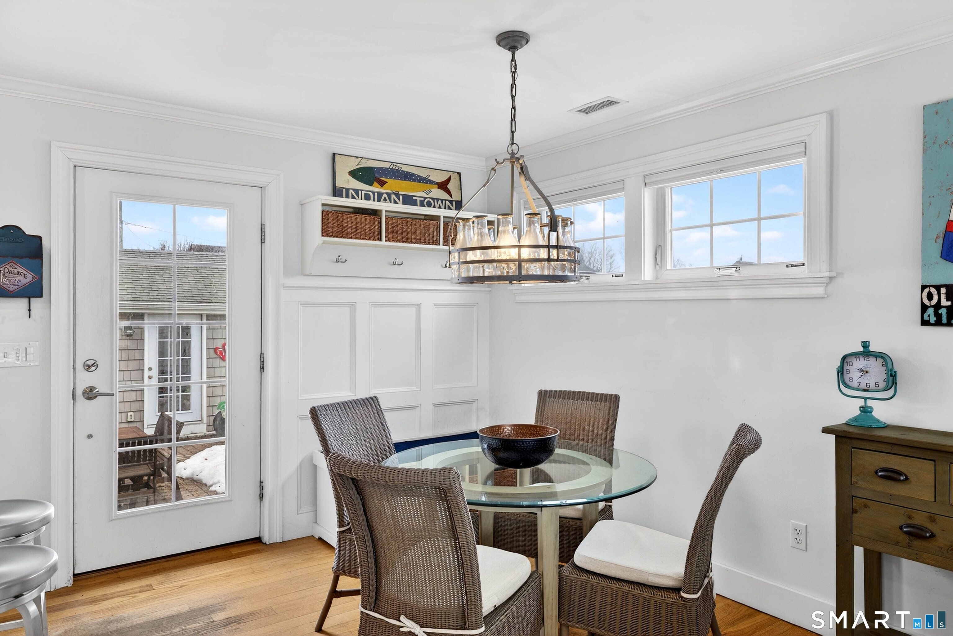 2 Pequot Trail Old Saybrook, CT 06475 - Photo 11 of 37 a view of a dining room with furniture window and wooden floor