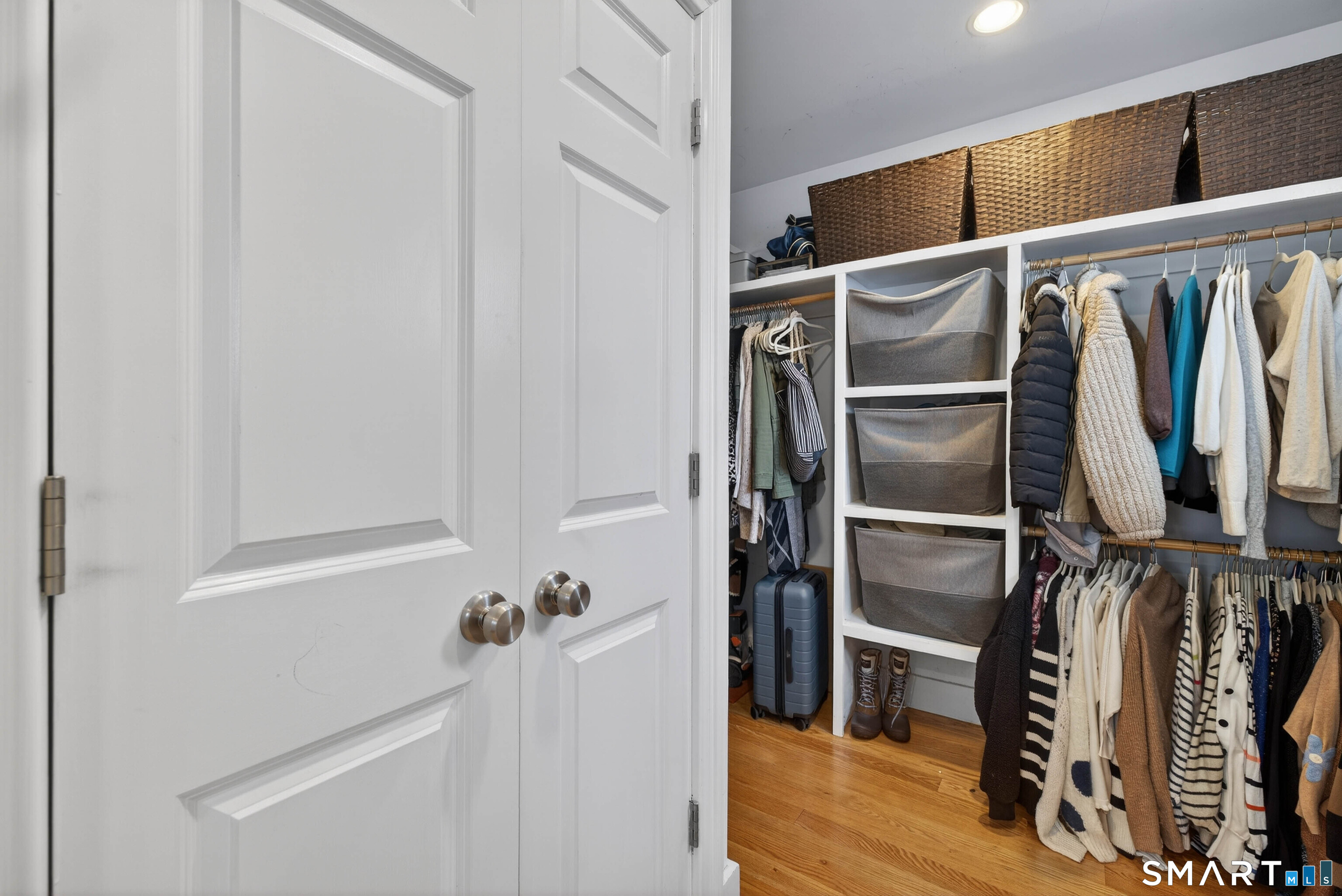 2 Pequot Trail Old Saybrook, CT 06475 - Photo 18 of 37 a view of walk in closet with clothes and shoes