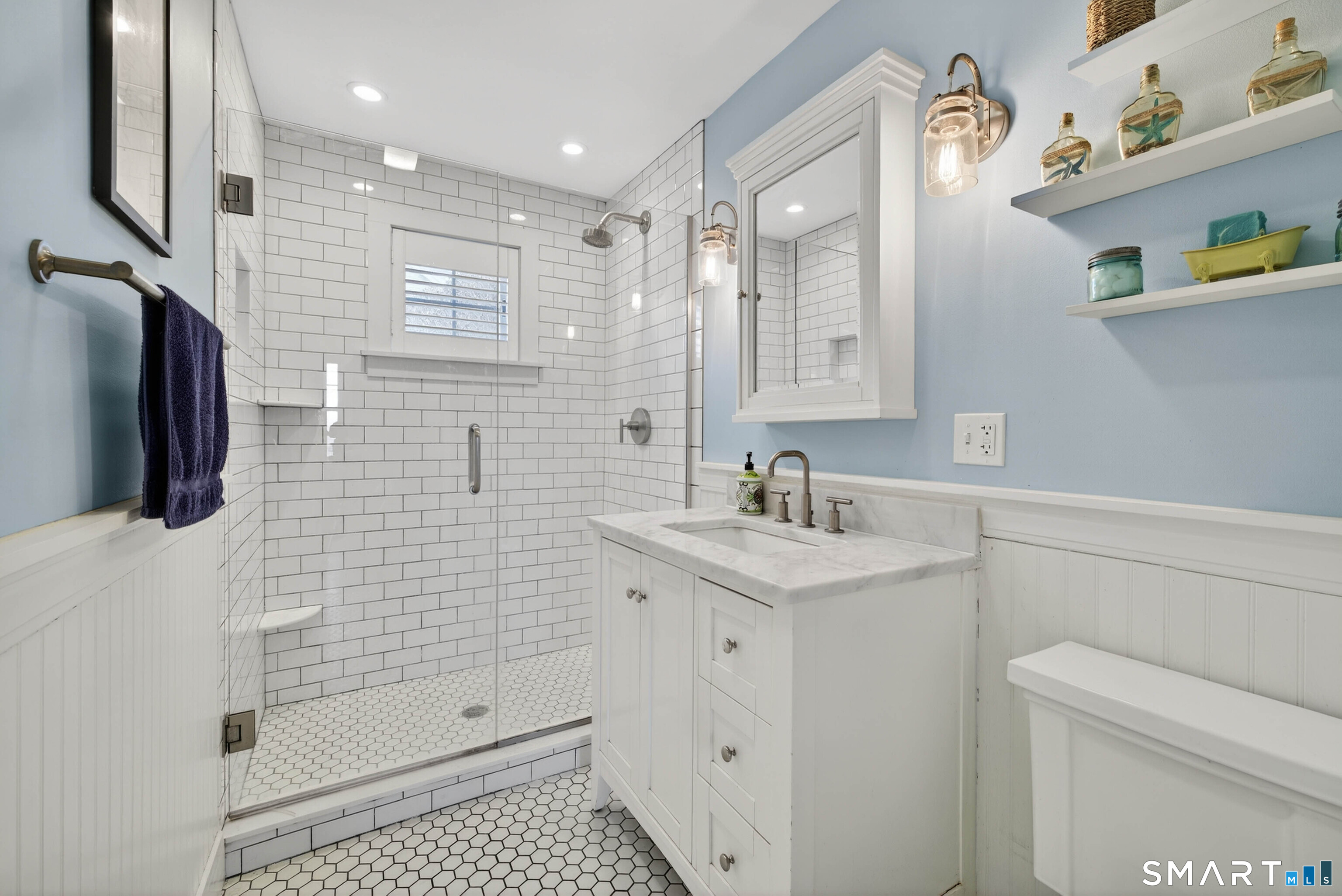 2 Pequot Trail Old Saybrook, CT 06475 - Photo 23 of 37 a bathroom with a sink a toilet and shower