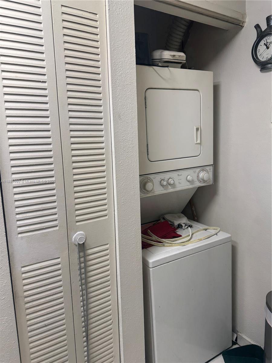 1975 West 44th Place, Unit 505 Hialeah, FL 33012 - Photo 14 of 28 a utility room with dryer and washer