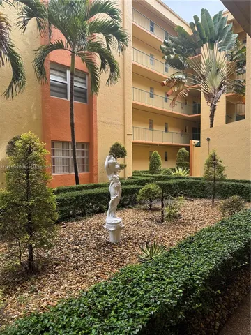 a bench sitting in front of a building