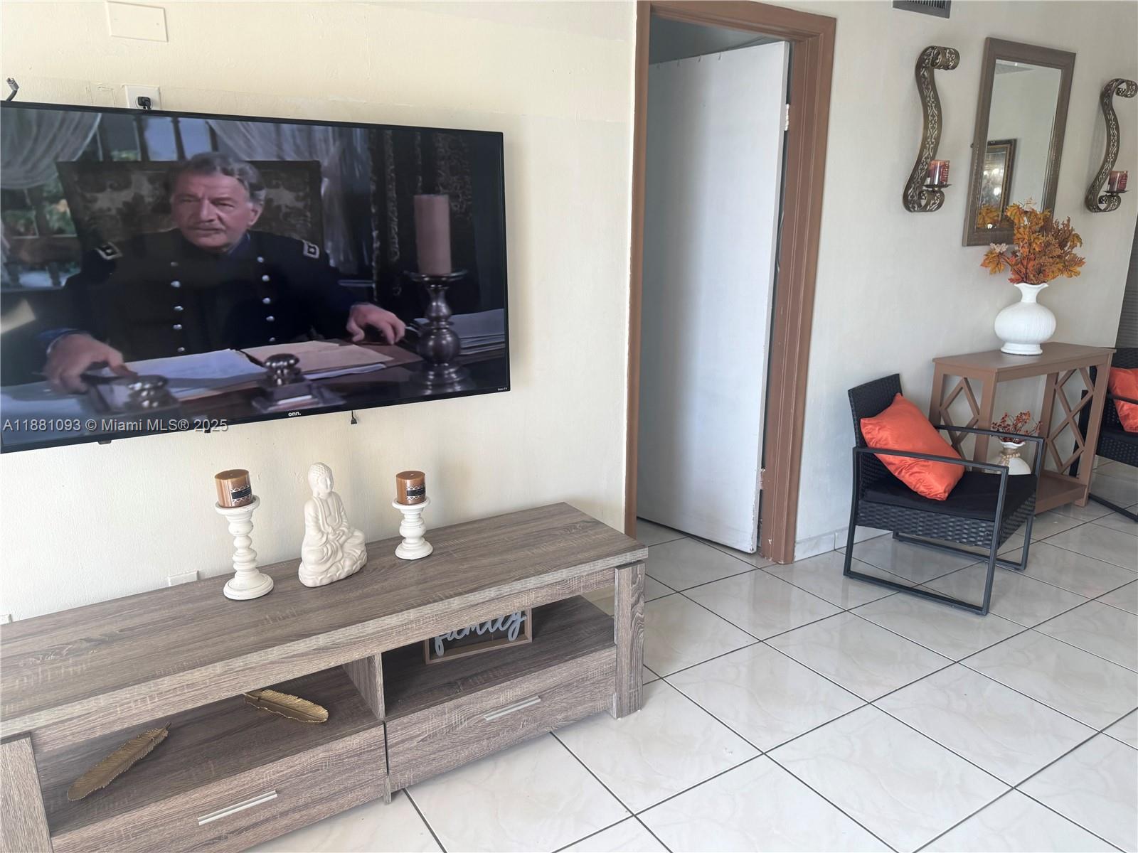 1975 West 44th Place, Unit 505 Hialeah, FL 33012 - Photo 23 of 28 a room with cabinets