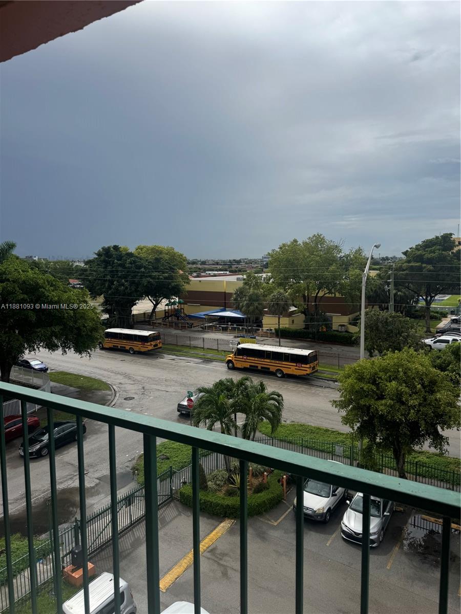 1975 West 44th Place, Unit 505 Hialeah, FL 33012 - Photo 5 of 28 a view of swimming pool from a balcony
