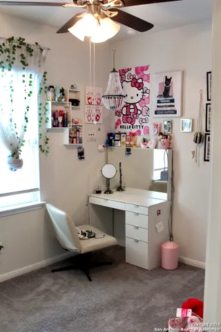 a room with a white cabinet and couch