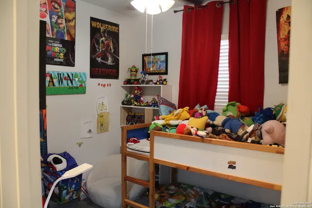 a room with toys and flowers