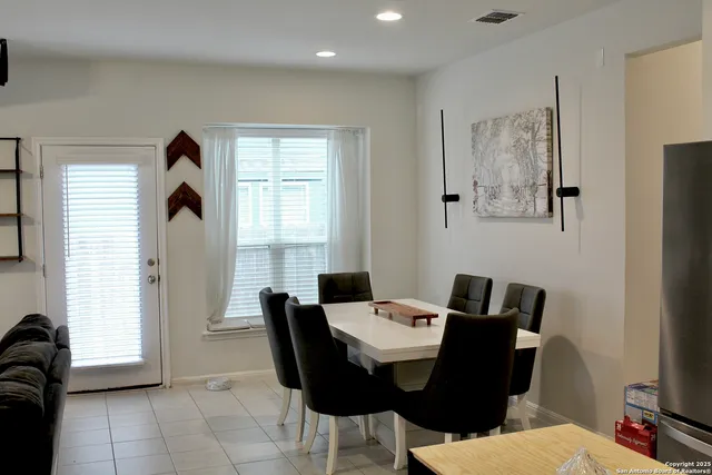 a workspace with furniture and window