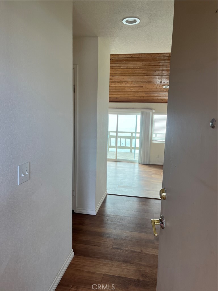 1532 Neptune Avenue Encinitas, CA 92024 - Photo 16 of 36 a view of an entryway with wooden floor