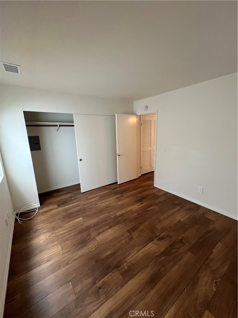 1532 Neptune Avenue Encinitas, CA 92024 - Photo 35 of 36 a view of empty room with wooden floor and fan