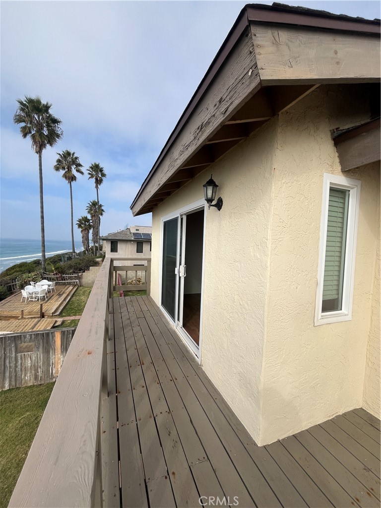 1532 Neptune Avenue Encinitas, CA 92024 - Photo 8 of 36 a view of a house with wooden deck