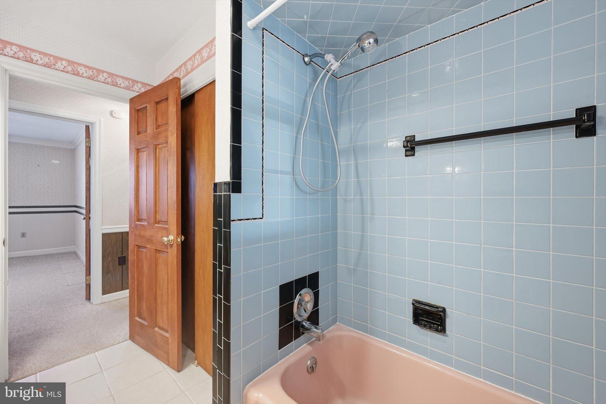 535 South 6th Street Denver, PA 17517 - Photo 16 of 41 a bathroom with a tub a toilet and a shower