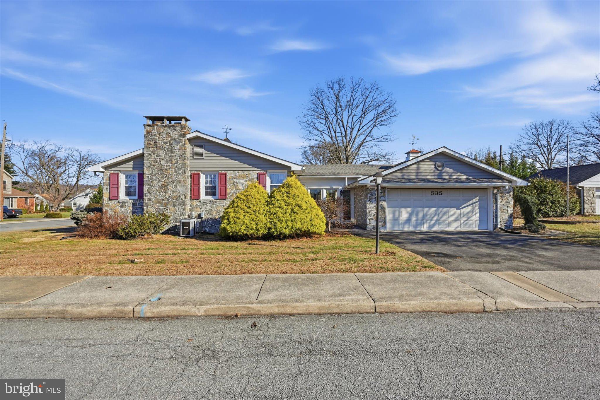 535 South 6th Street Denver, PA 17517 - Photo 38 of 41 a front view of a house with a yard and garage